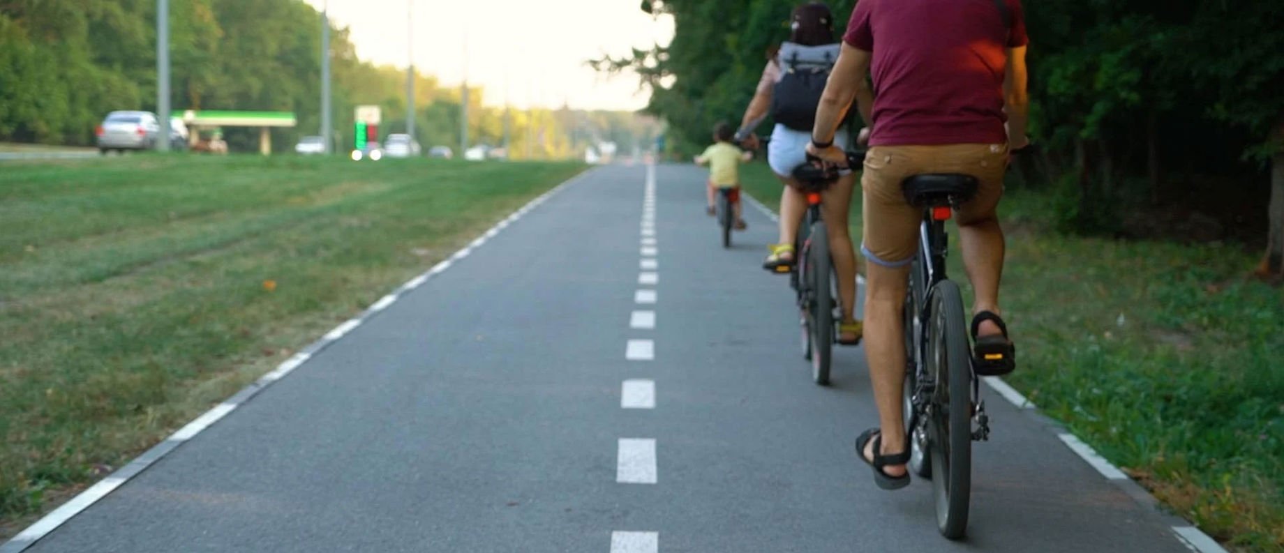 People cycling along a street