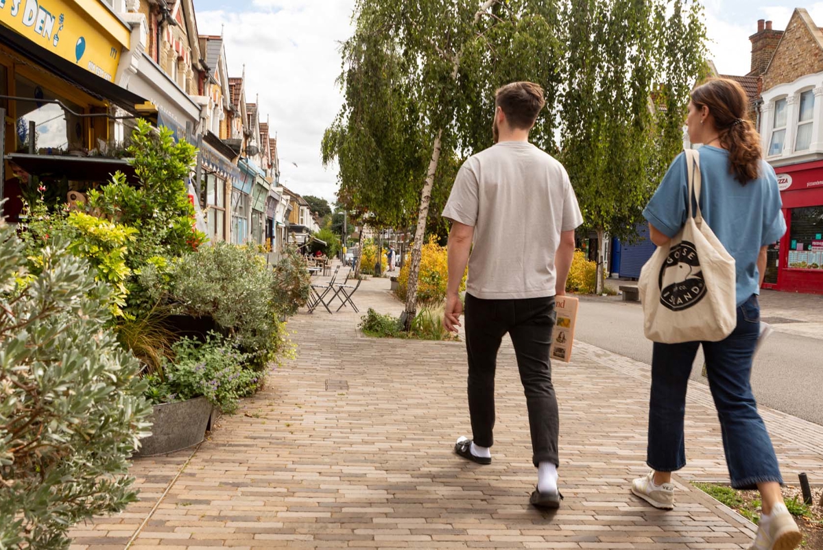 Couple walking along the street