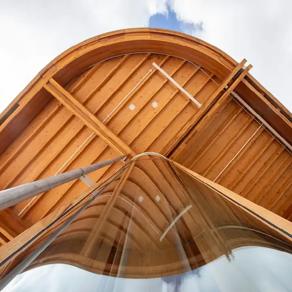 A wooden structure with a curved top.