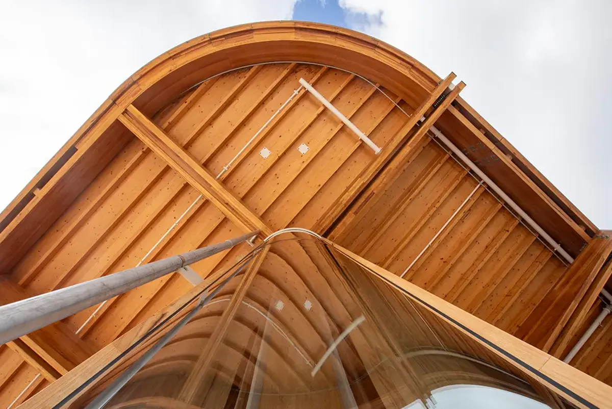 A building with a curved roof.