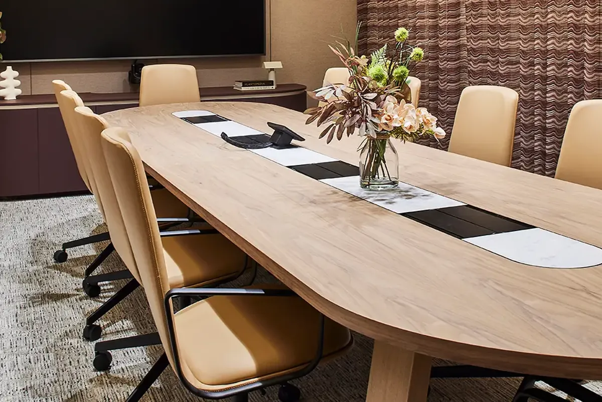 A table with chairs around it.