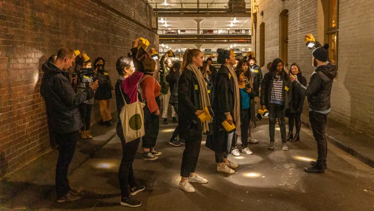 A group of people standing in a line.