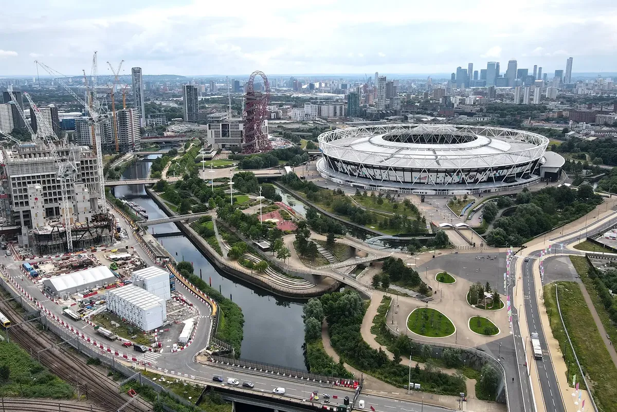 A large stadium in a city.
