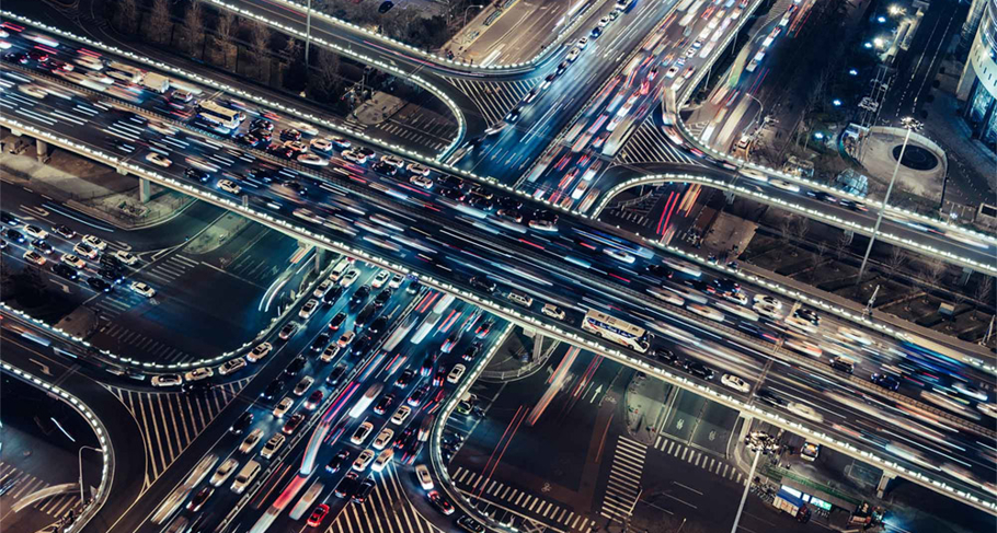 Busy freeway junction at night