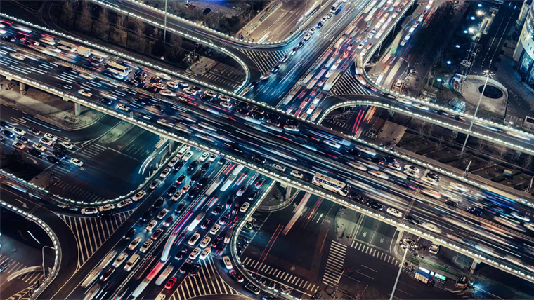 Busy freeway junction at night