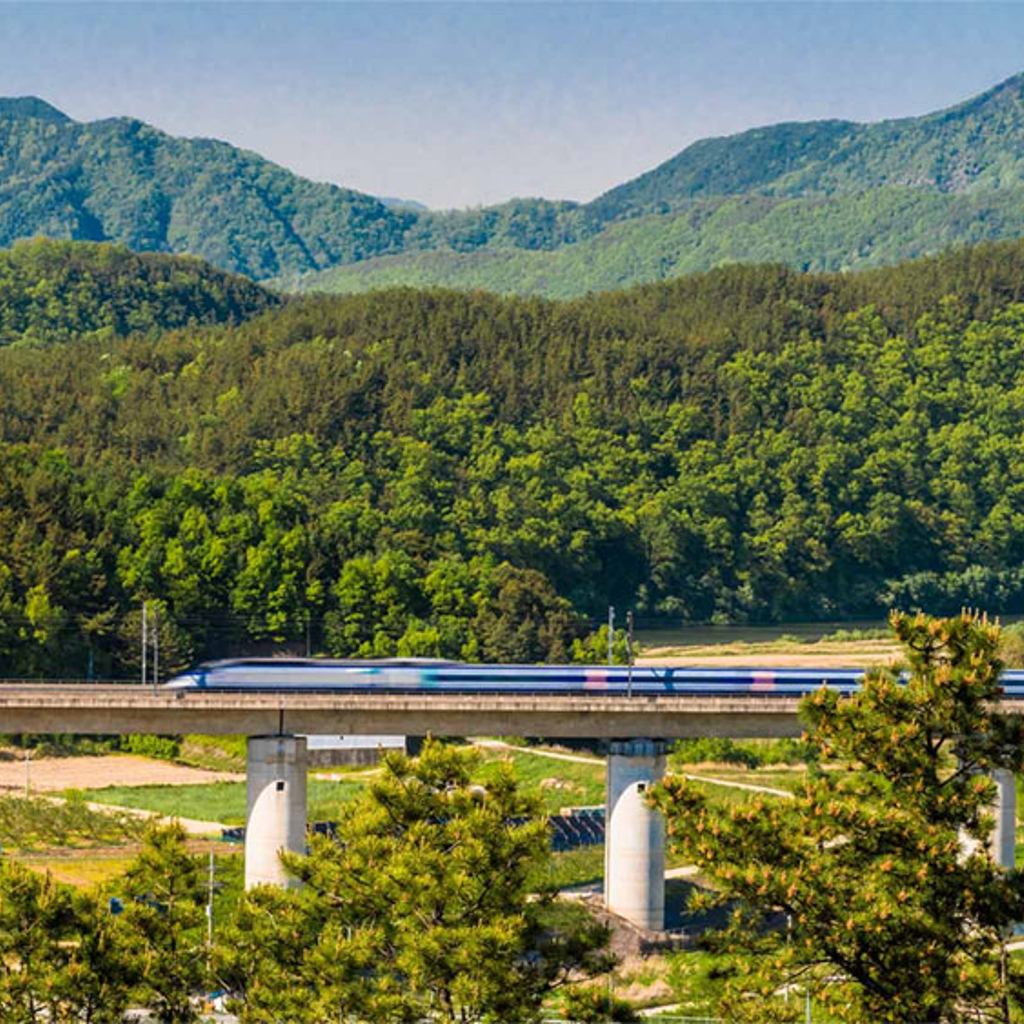 High speed train travelling across the countryside