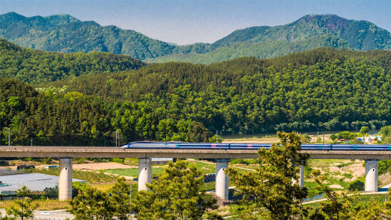 High speed train travelling across the countryside