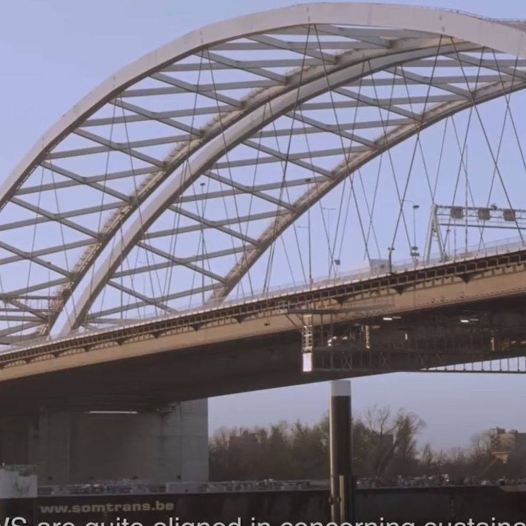 A bridge with a metal frame.