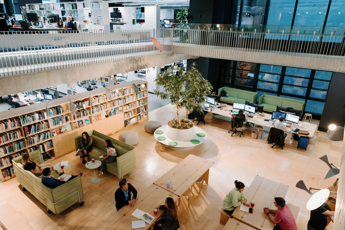 A high angle view of people in a library.