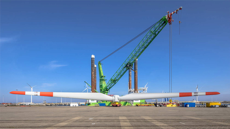 Wind turbine blade on the shore under construction