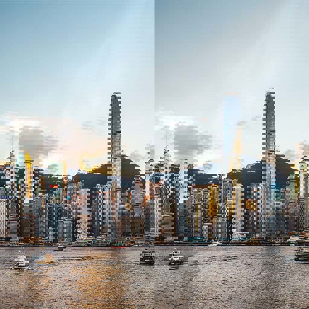 A city skyline with boats.