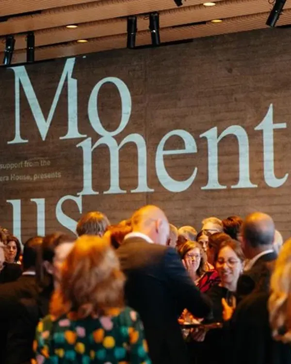 A group of people in a room.