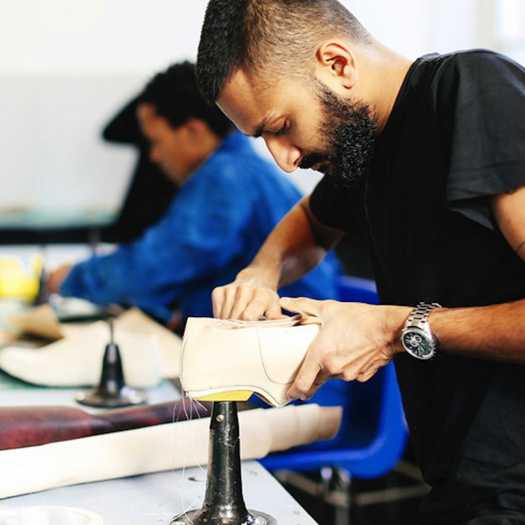 People working in a workshop near the Olympic Park