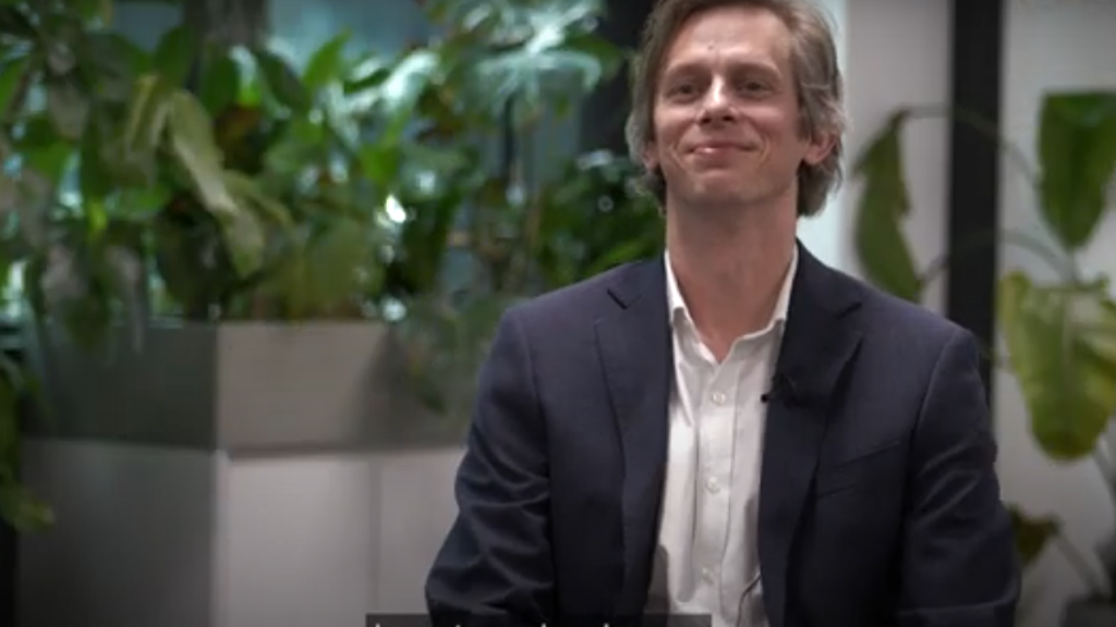 A person in a suit.
