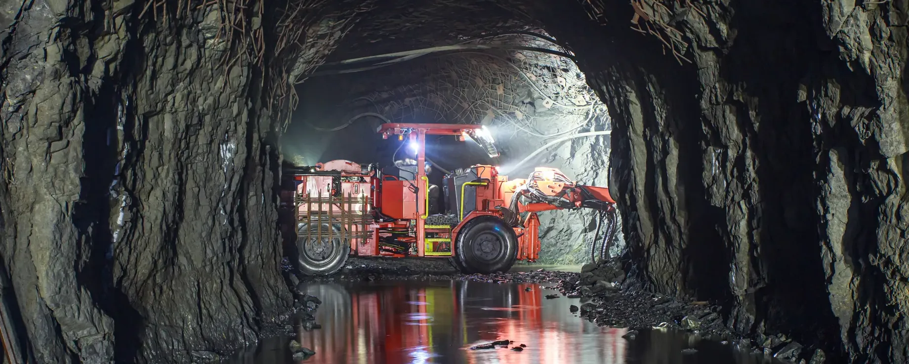 Underground equipment. Special load vehicle for mines and tunnels. Iron ore mine