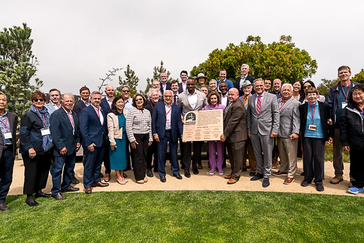 A group of project players posing for a photo at the celebration