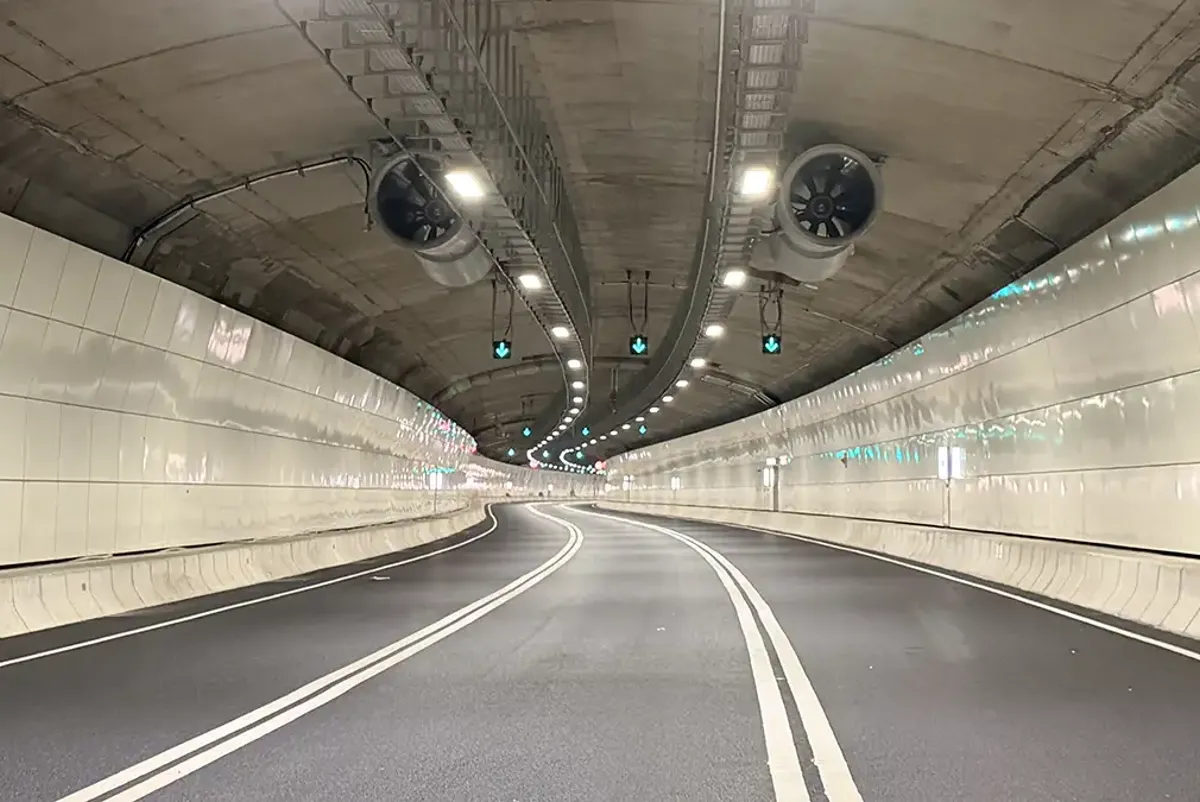 A tunnel with lights.