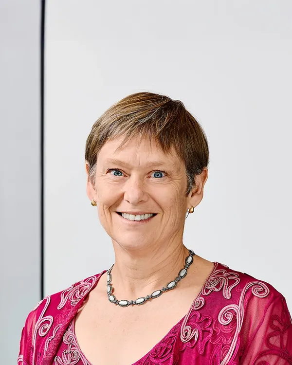 A person smiling for the camera.