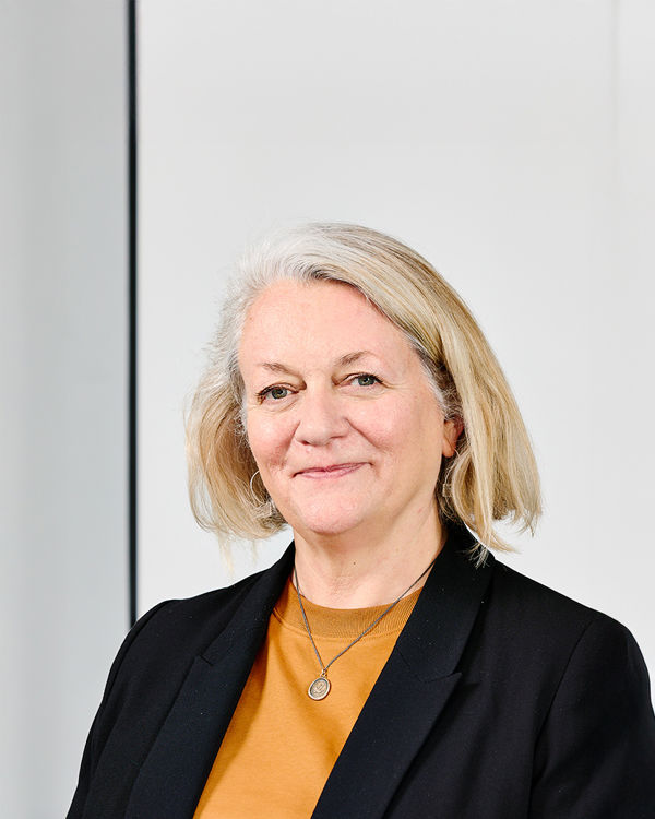 A person in black suit.