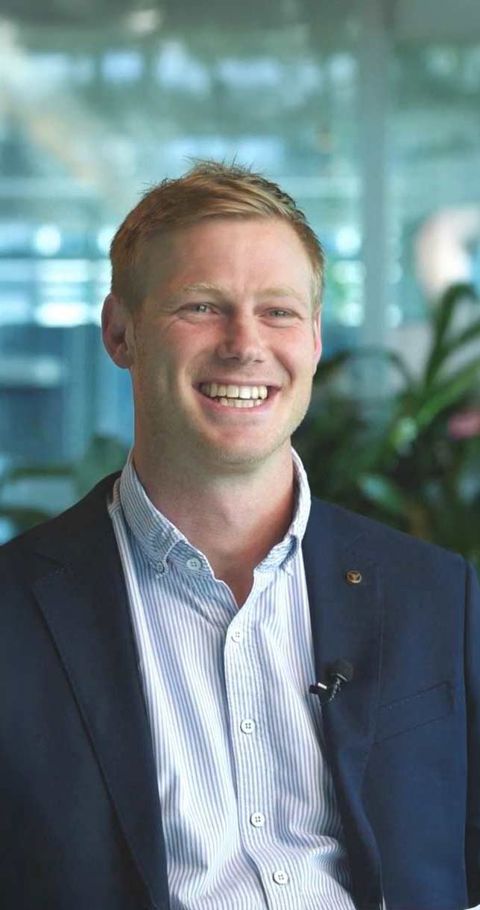 A man smiling for the camera.