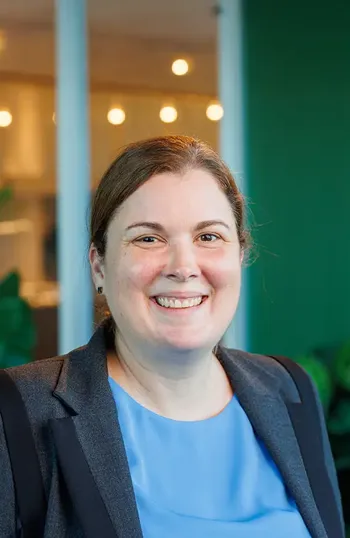 A person smiling for the camera.