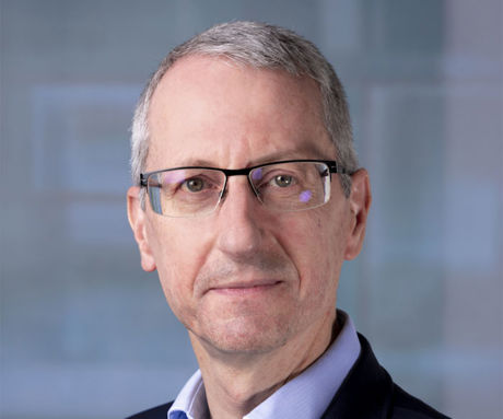 A man wearing glasses.