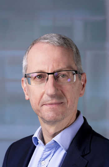 A man wearing glasses.