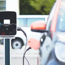 An electric vehicle being charged