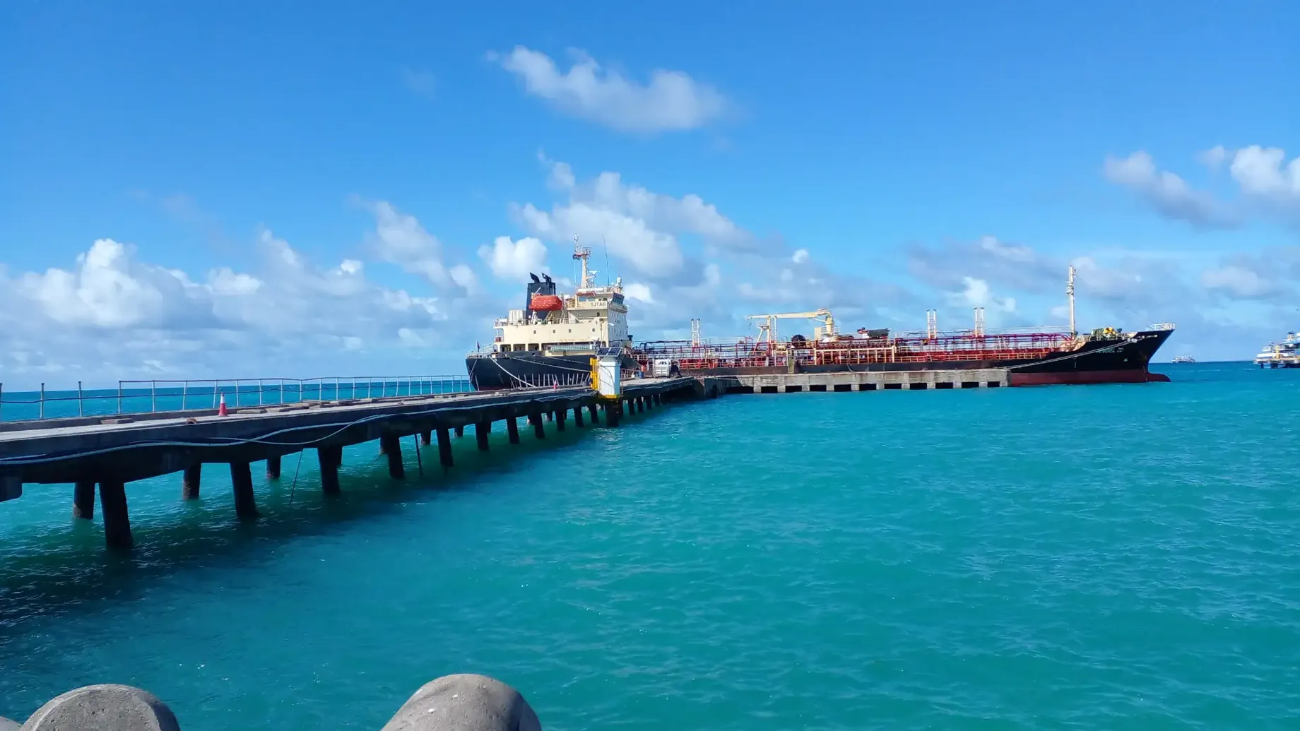 A large ship at a dock.