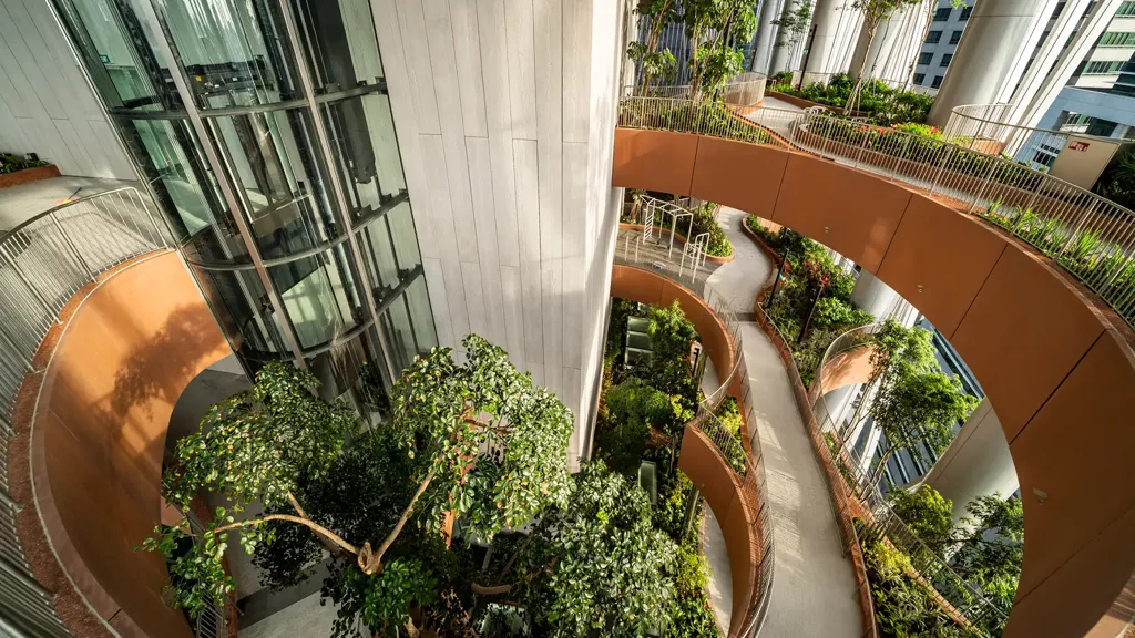 Aerial view of green landscapes inside a tall building