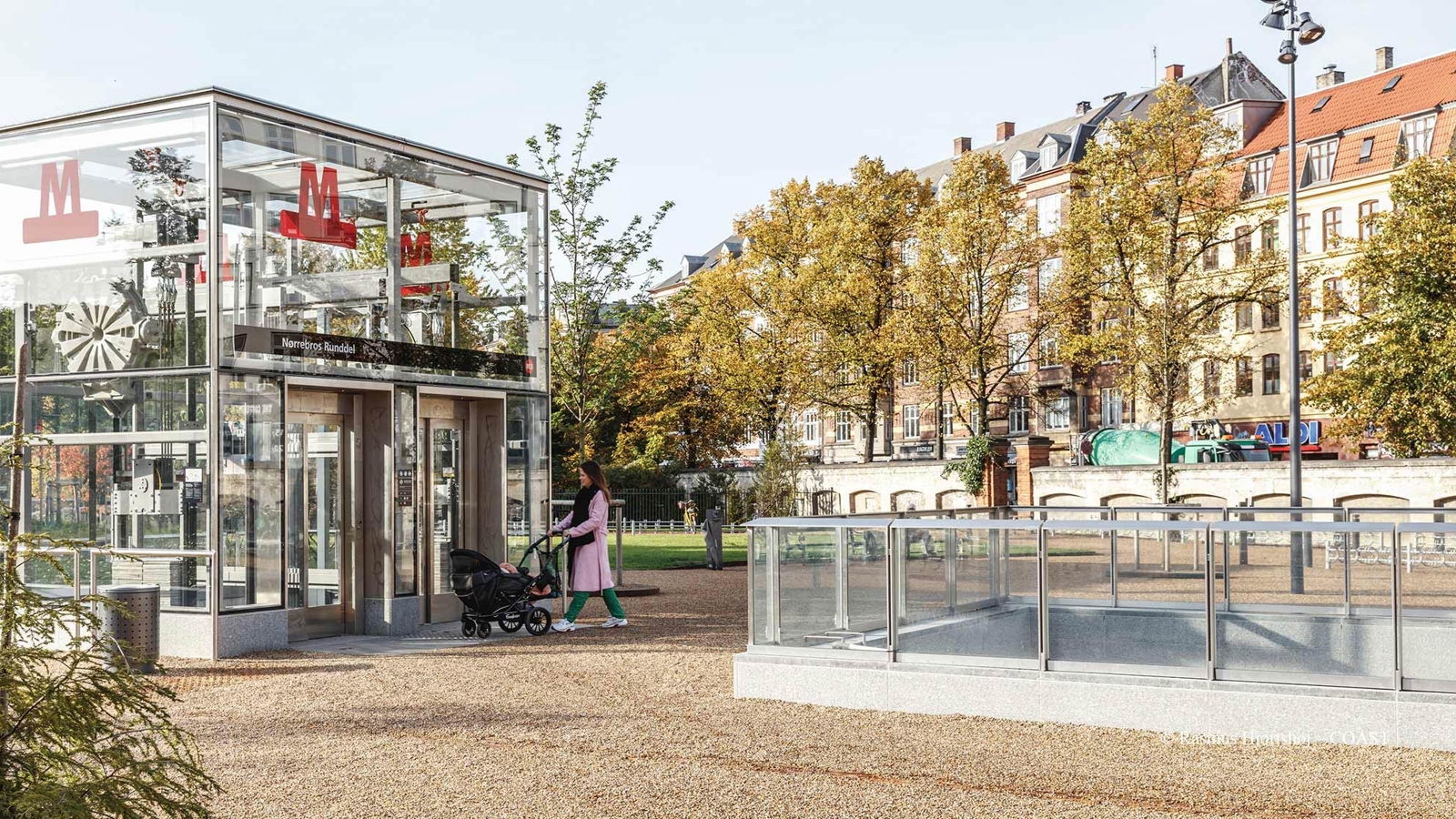 A woman and child outside a Cityringen station 