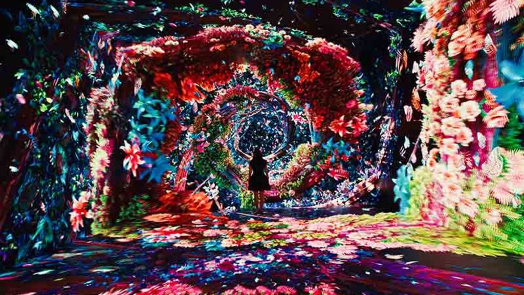 A person standing in the gallery C infinity room at Dataland