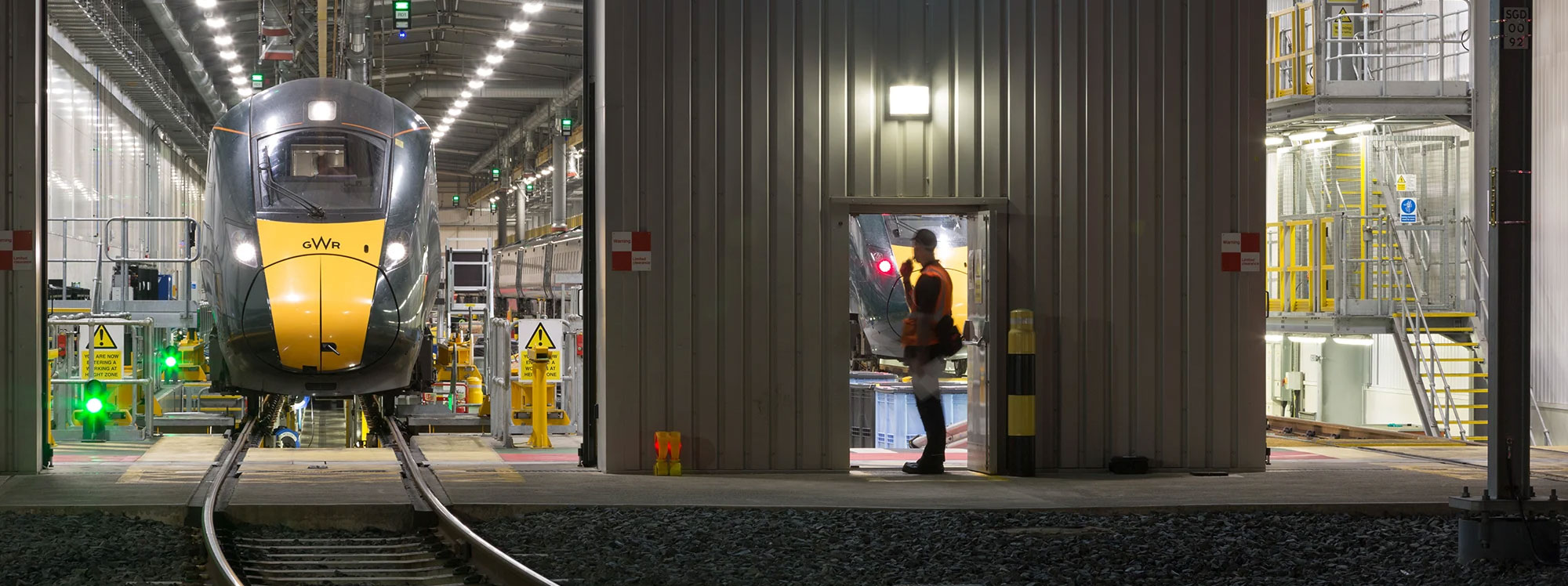 Great Western train in a depot undergoing maintenance