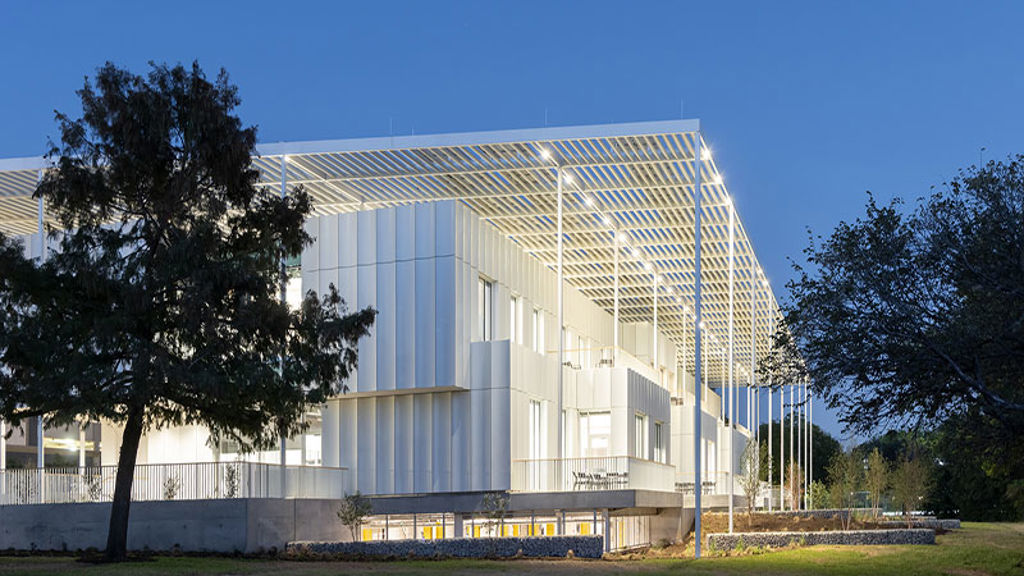 A building with a glass front.