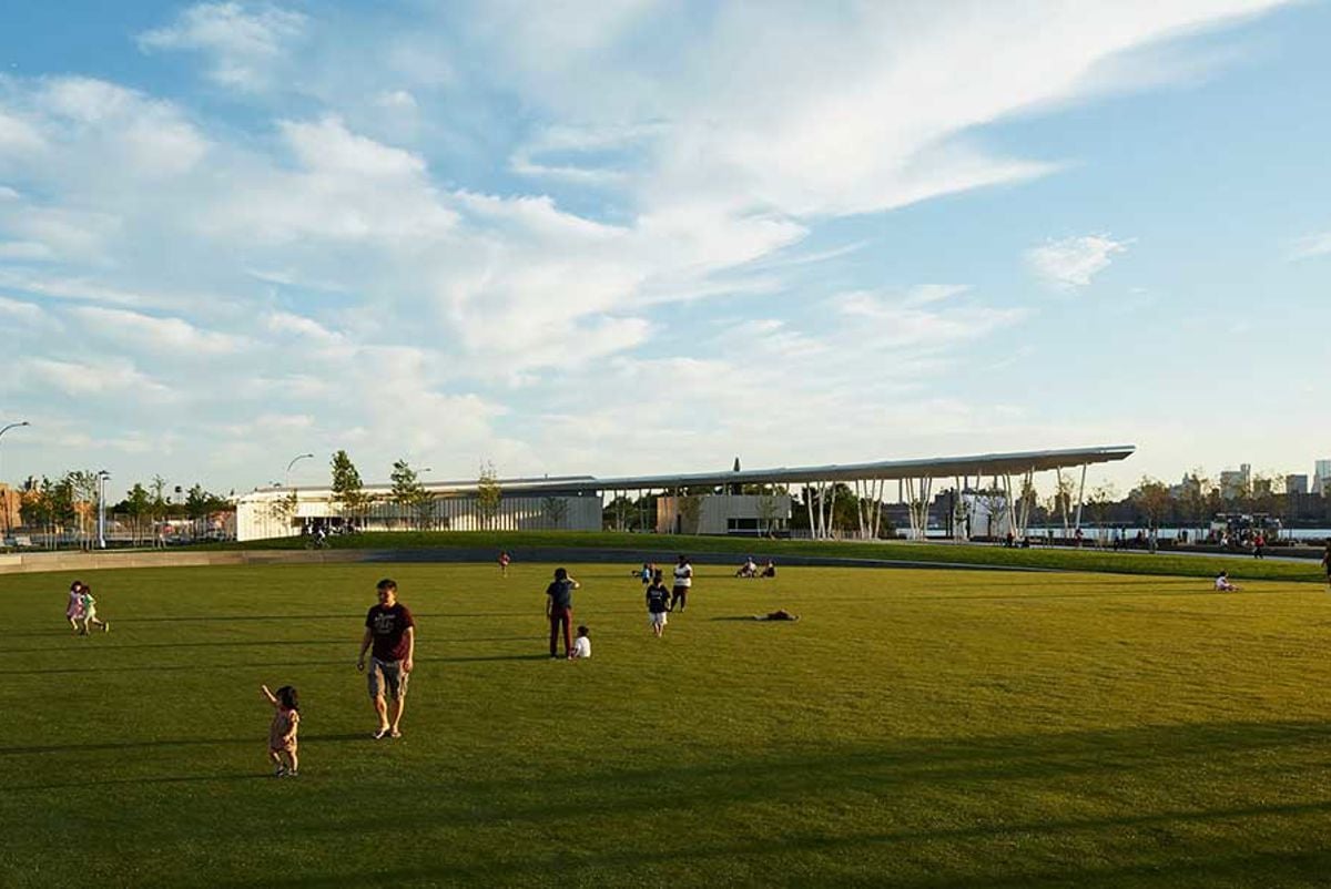 Family enjoying green space at Hunters Point south