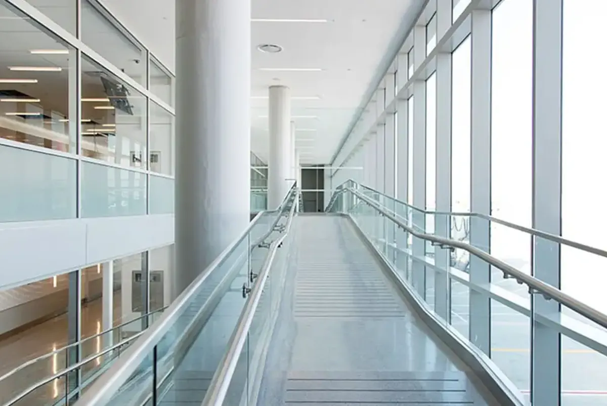 A long escalator in a building.