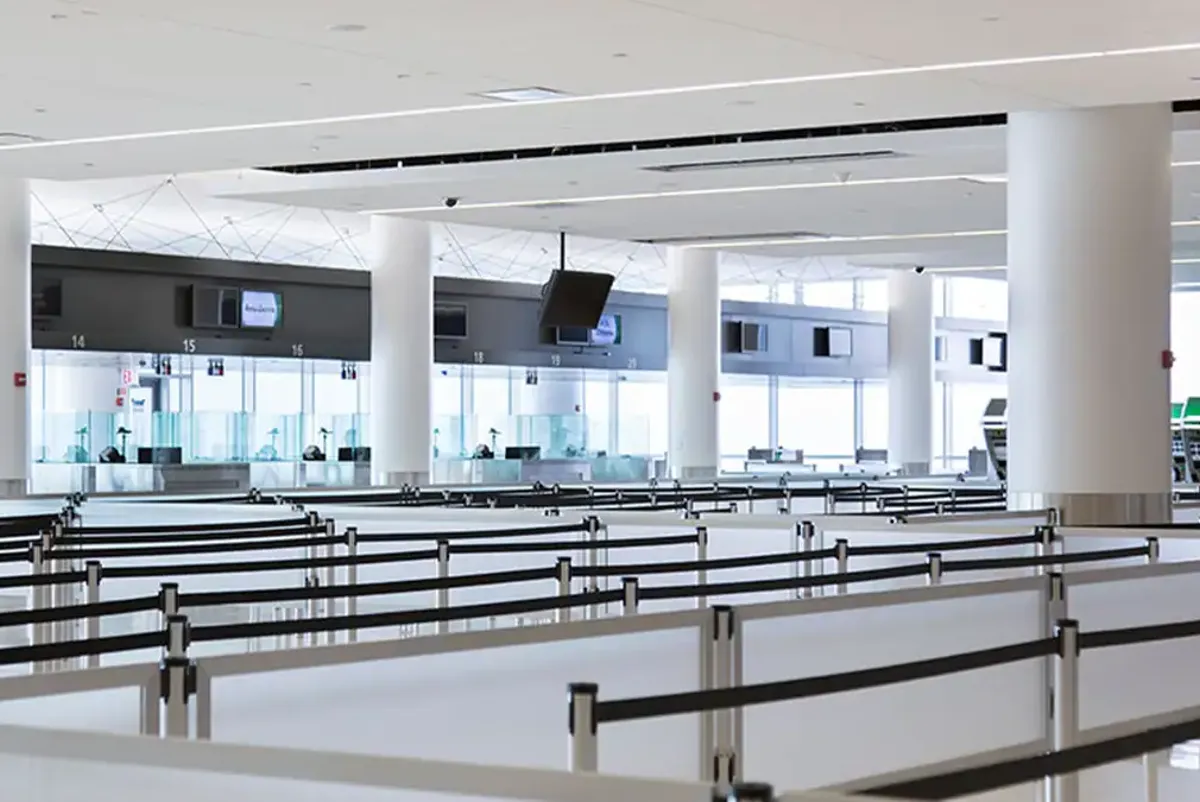 A large room with tables and chairs.