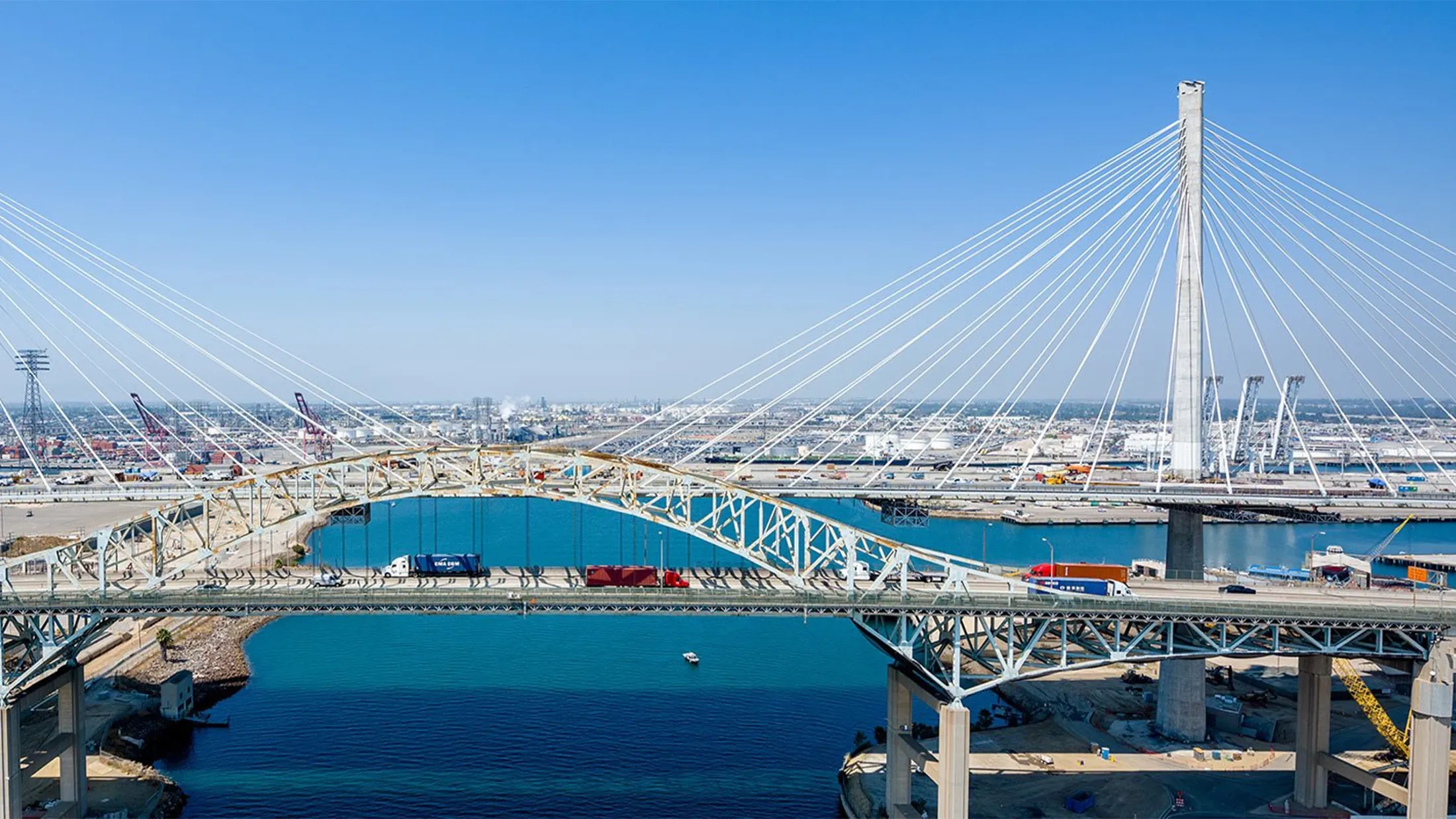 Side view of a cable-stayed bridge over water