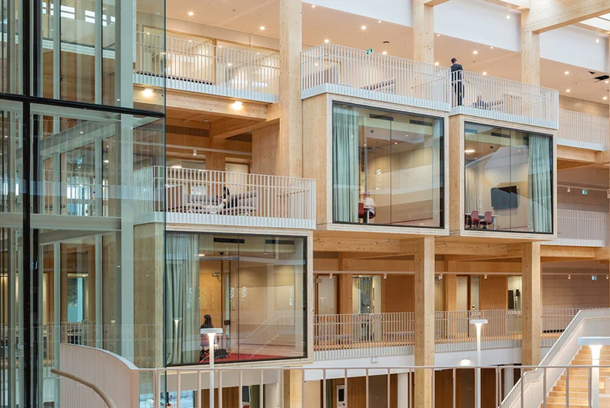 Inside the atrium at The Michael Kirby Building. Rooms and spaces cantilever into the void. Credit: FCD