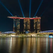 An exterior shot of Marina Bay Sands at night