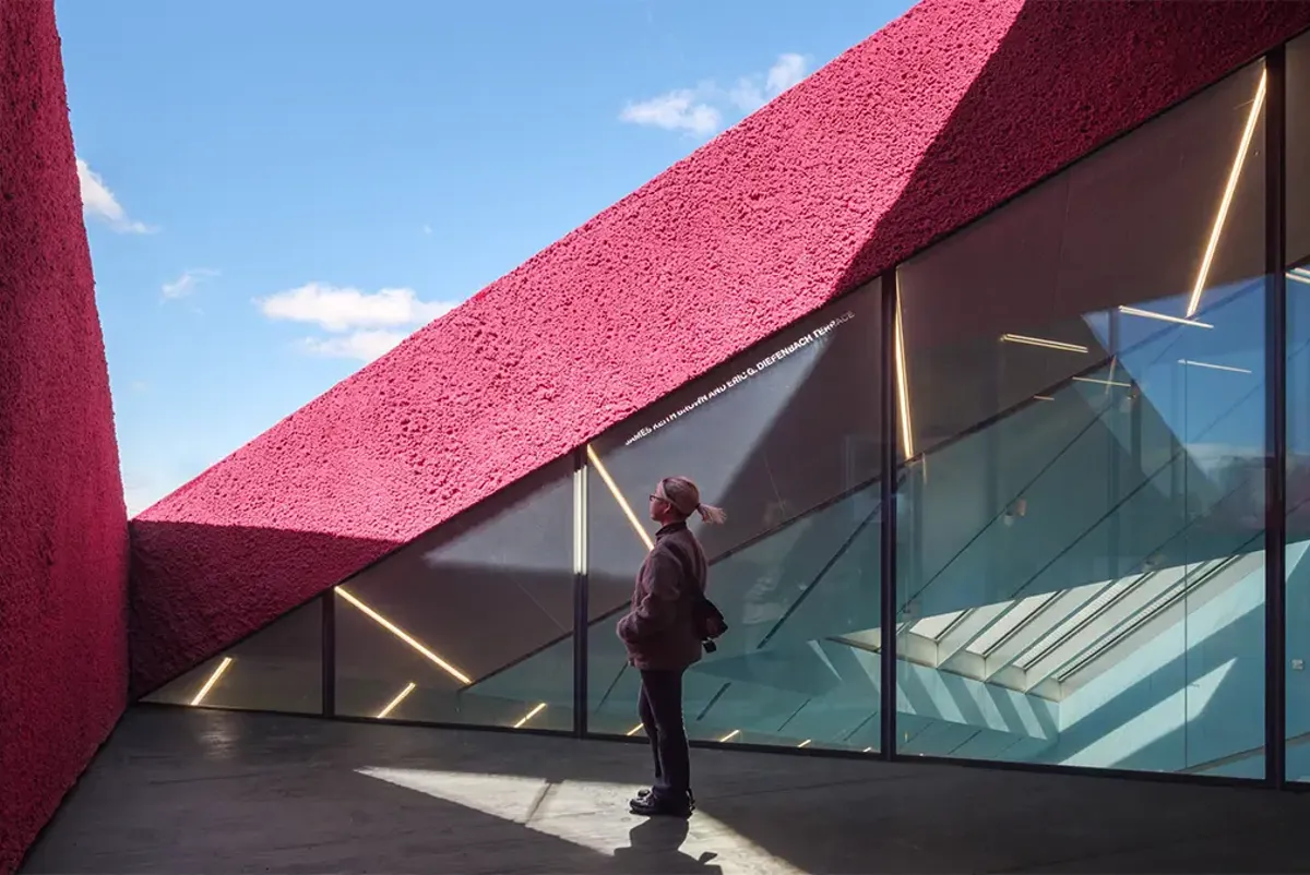 A person looking at a building.