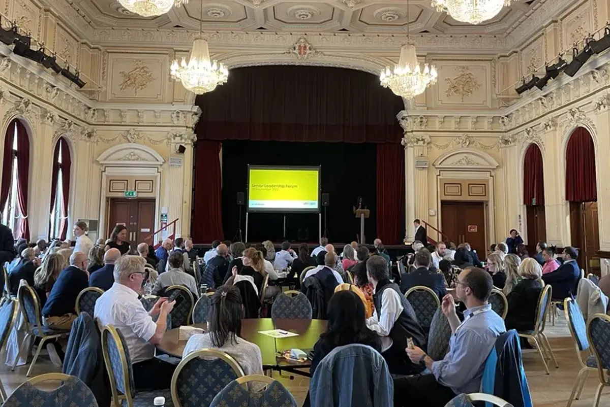 A person giving a presentation to an audience.