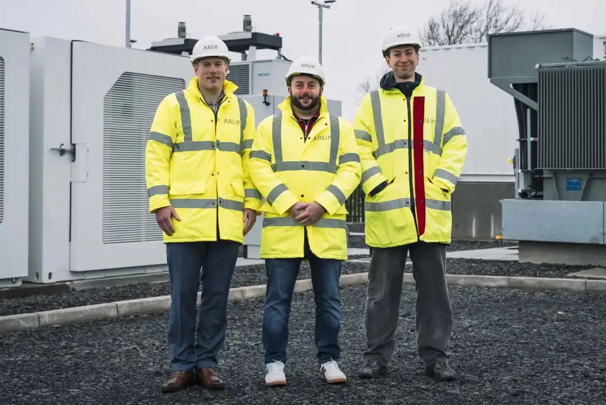 Three Arup engineers on site at Northern Ireland Water project in hi-vis jackets