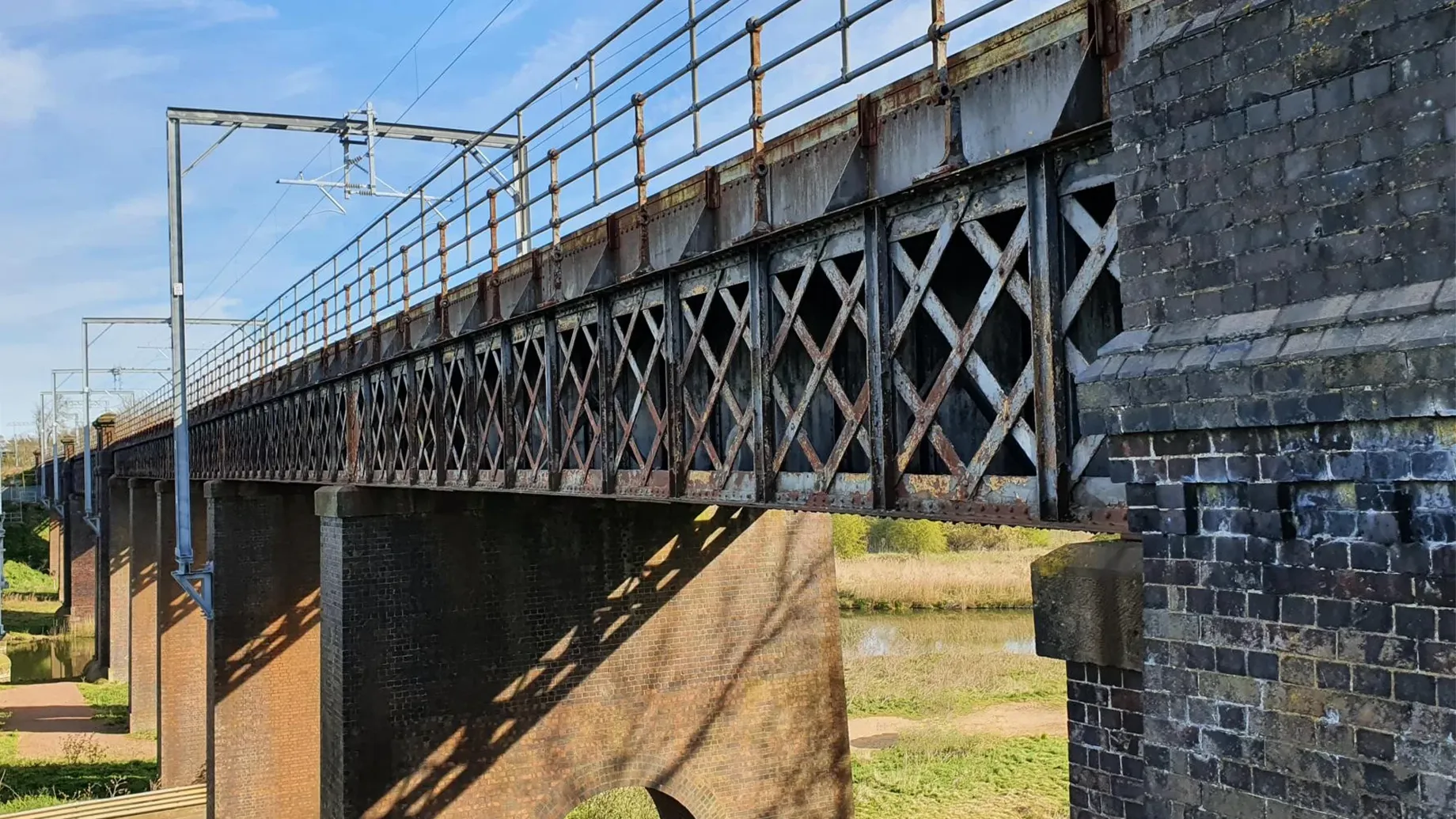 A bridge with a stone wall.