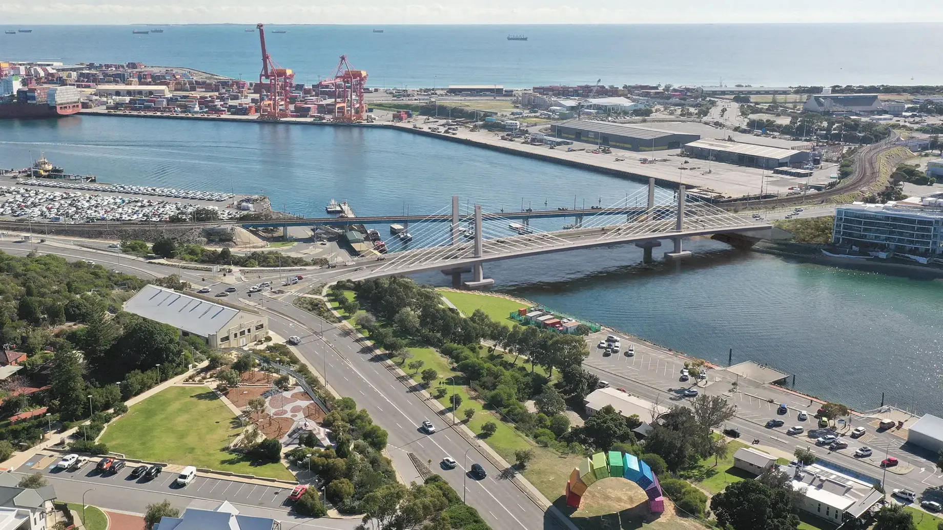 Artist impression of view over Fremantle with the new traffic bridge crossing the river