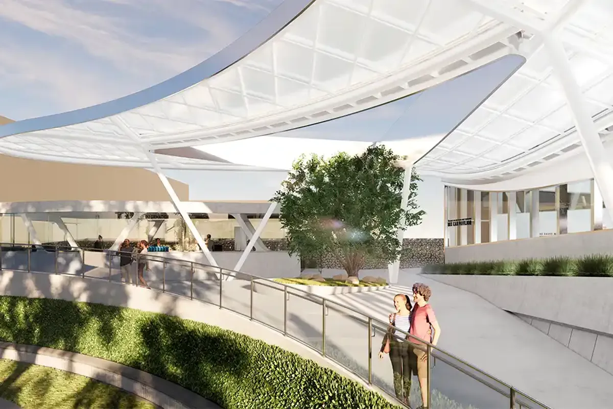 A couple standing outside the Learning Center Pavilion