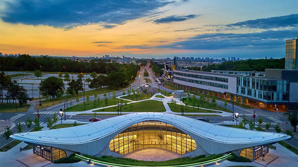 A large courtyard with a building in the background.