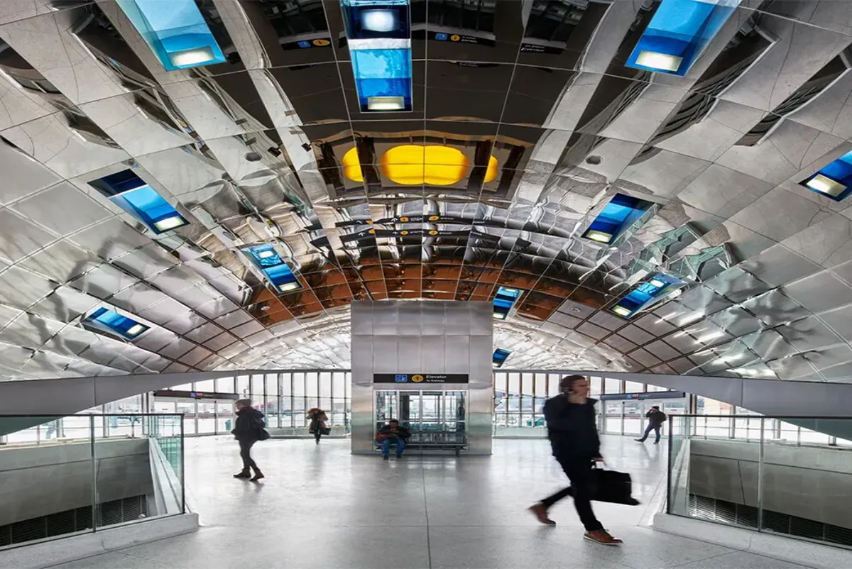 People walking in a large building.