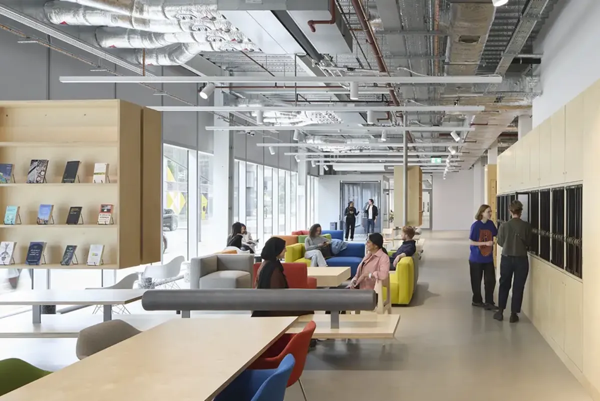 A group of people in a room.