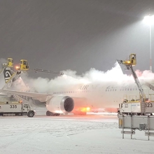 Plane being de-iced